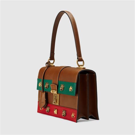 gucci cat lock leather top handle|GUCCI Calfskin Medium Cat Lock Top Handle Bag Red.